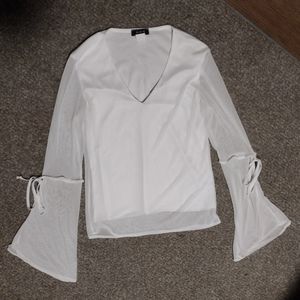 White bell sleeved top